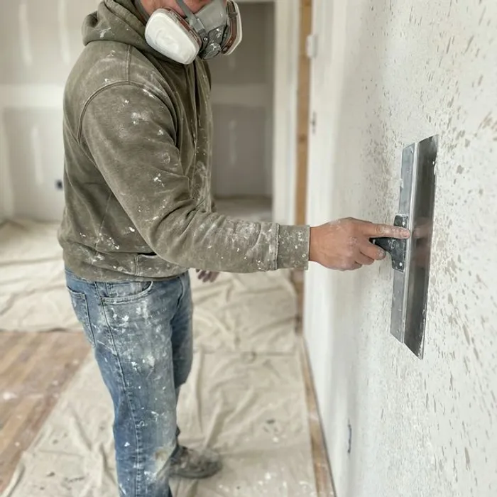 Contractor applying custom drywall texture in Bakersfield