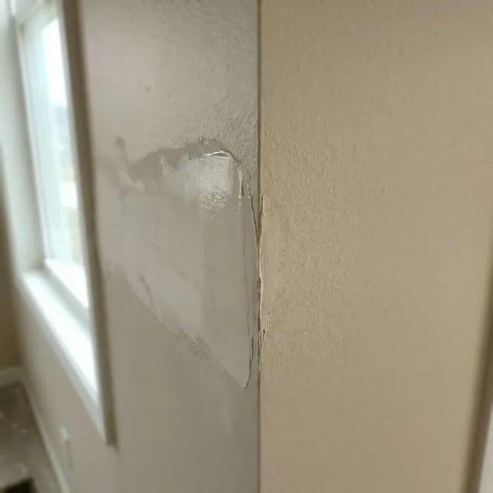 Seamlessly blended drywall patch transition